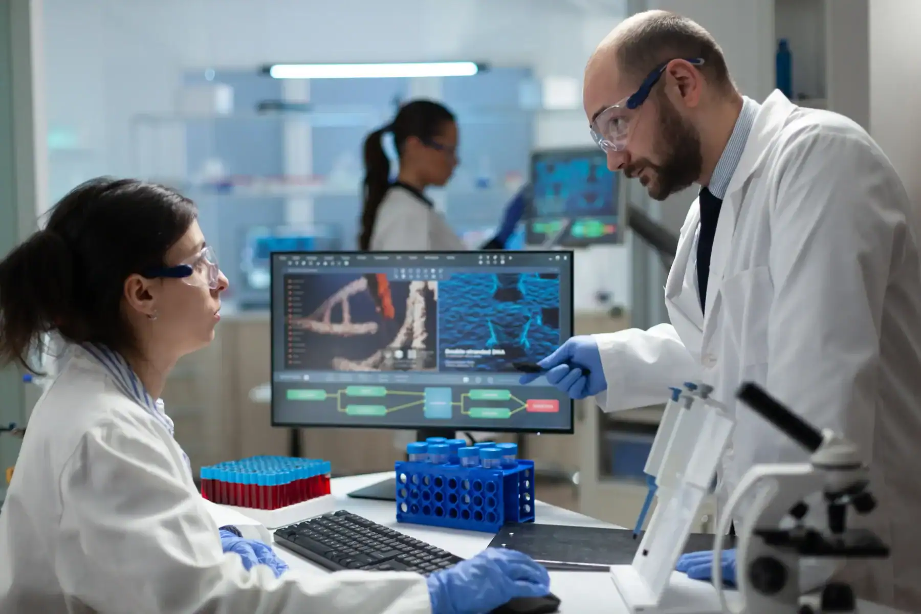 Laboratory researchers reviewing analytical results together.